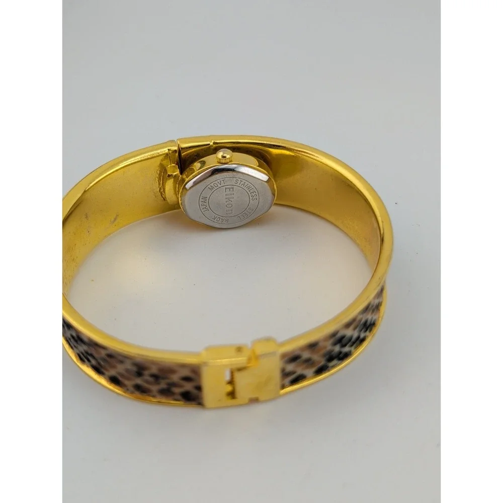 Eikon Women Watch 17mm Hidden Dial Gold Case Snakeskin Cuff 6.5